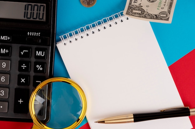 A close-up shot of a 1040 tax form with the Saver's Credit section highlighted, with a calculator and pen nearby, symbolizing tax preparation and awareness of the credit.