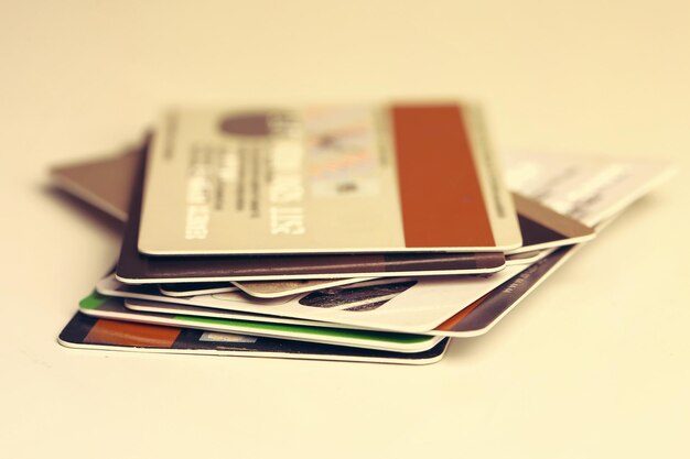 A visual representation of different types of debt (credit cards, personal loans, medical bills) merging into a single, simplified payment plan. Lines converge towards a central point signifying consolidation.