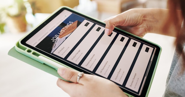 A person holding a smartphone displaying a comparison website showing different internet and cable provider options with their prices and features.