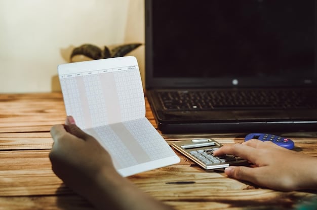 A close-up of hands calculating expenses on a budget spreadsheet with a calculator and household bills nearby.