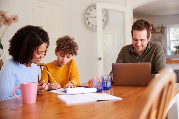 A family sitting at a table, reviewing financial documents and using a laptop. They are smiling and engaged in a discussion about saving for college.