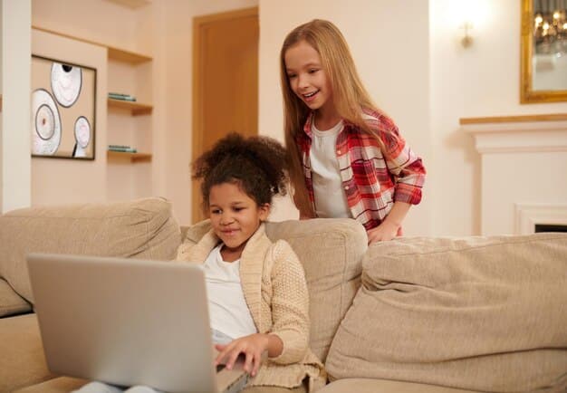 A working mother is smiling as she works on her laptop at home while her children play quietly nearby. The setup symbolizes how Dependent Care FSA can help parents balance work and family life.
