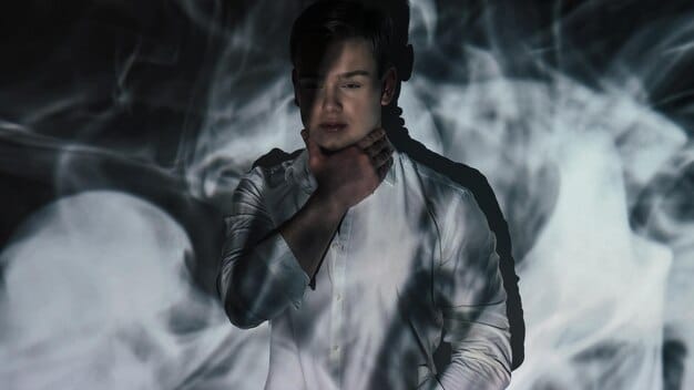 A scene from a K-Drama showing a villain in a powerful pose, surrounded by chaos or symbols of their influence. The lighting and composition emphasize the villain's dominance and control.