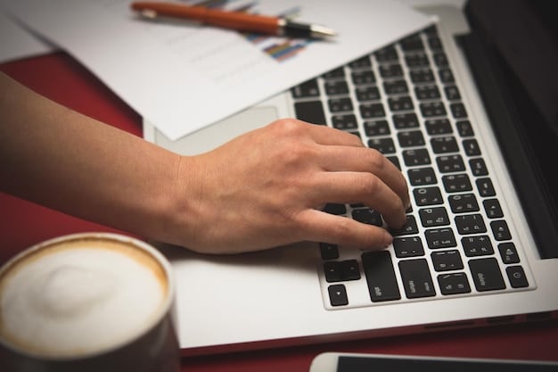 A close-up shot of a person's hands typing on a laptop, symbolizing the process of writing an episode recap.