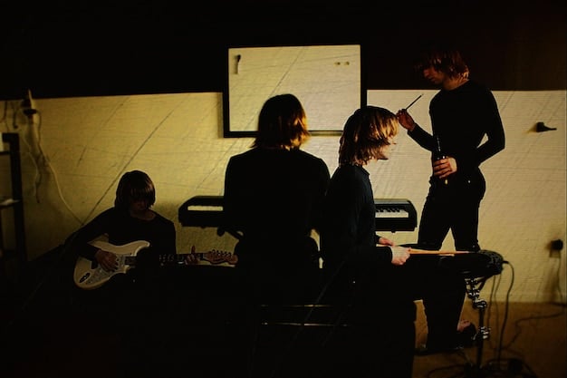 A behind-the-scenes shot of the cast and crew of [Episode Title] on set, highlighting the collaborative effort behind the episode.