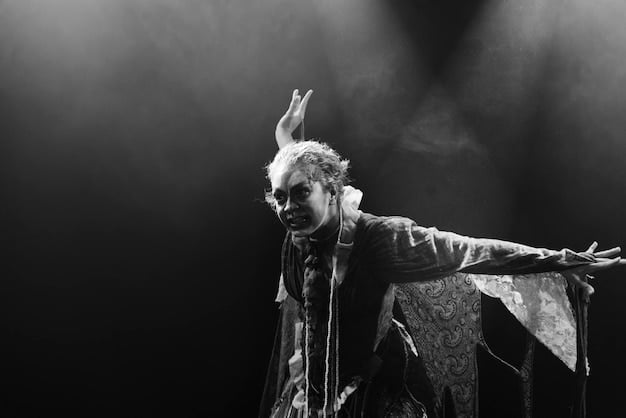 A black and white image of a scene from a classic Shakespearean play, with actors in period costumes delivering dramatic lines on a grand stage.